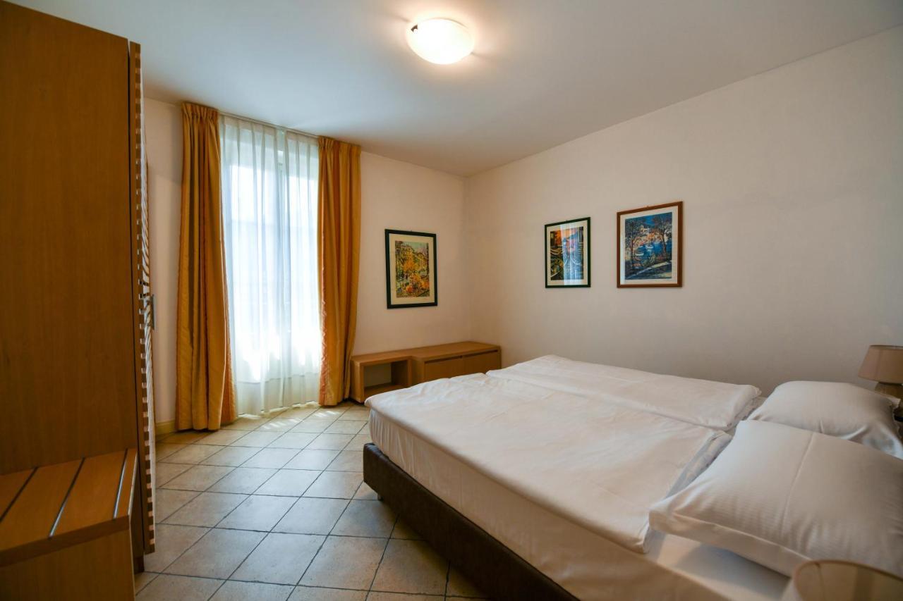 Aquazzurra Resort & Aparthotel Канобио Екстериор снимка