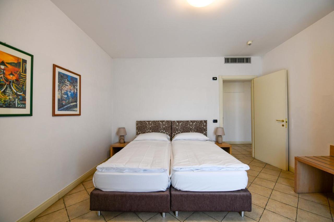 Aquazzurra Resort & Aparthotel Канобио Екстериор снимка