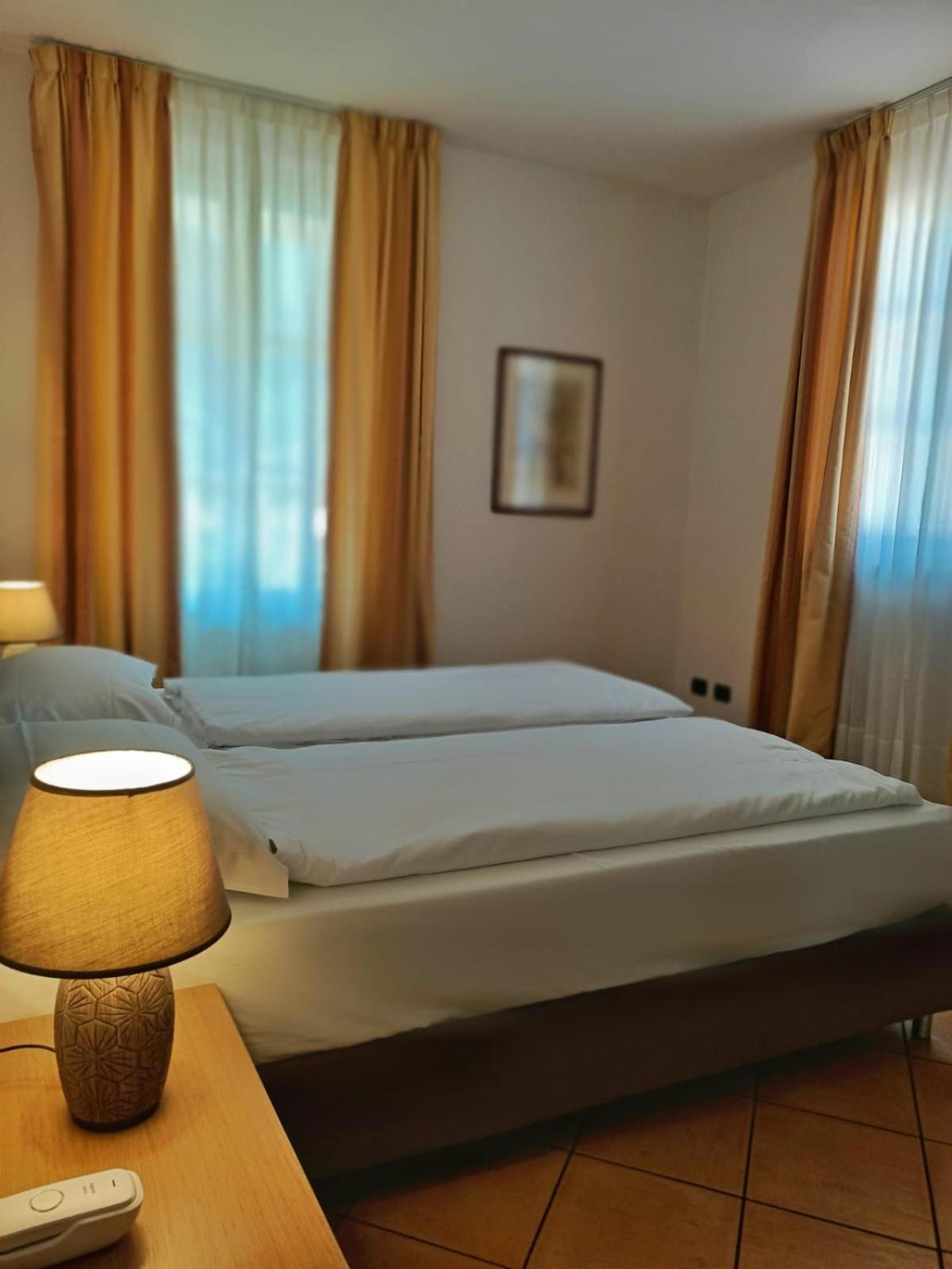 Aquazzurra Resort & Aparthotel Канобио Екстериор снимка