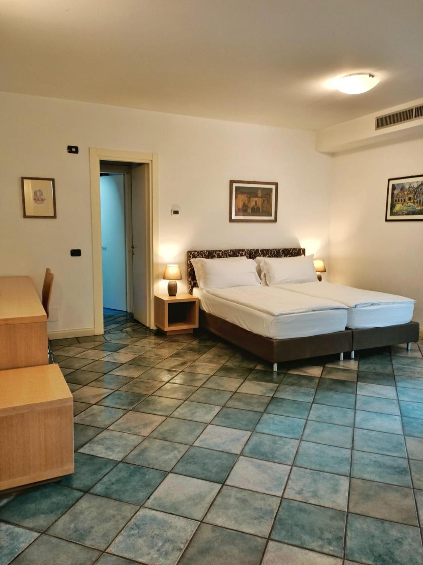 Aquazzurra Resort & Aparthotel Канобио Екстериор снимка