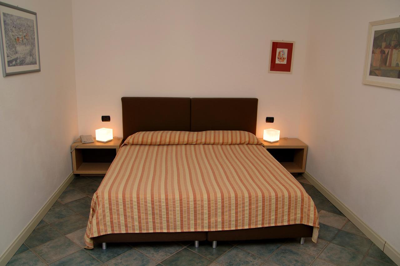 Aquazzurra Resort & Aparthotel Канобио Екстериор снимка